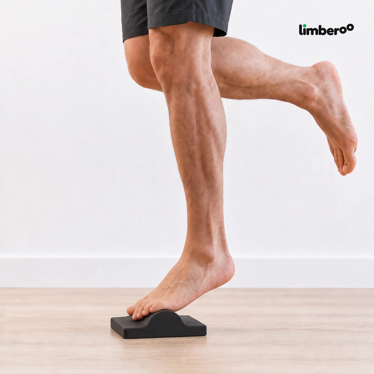 Single-leg heel raise on the foot trainer: toes over the hump, heel high